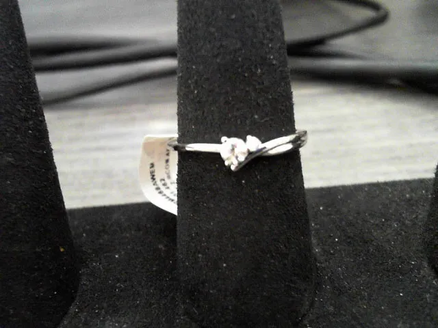 10K WHITE ZIRCON AND DIA TWIST