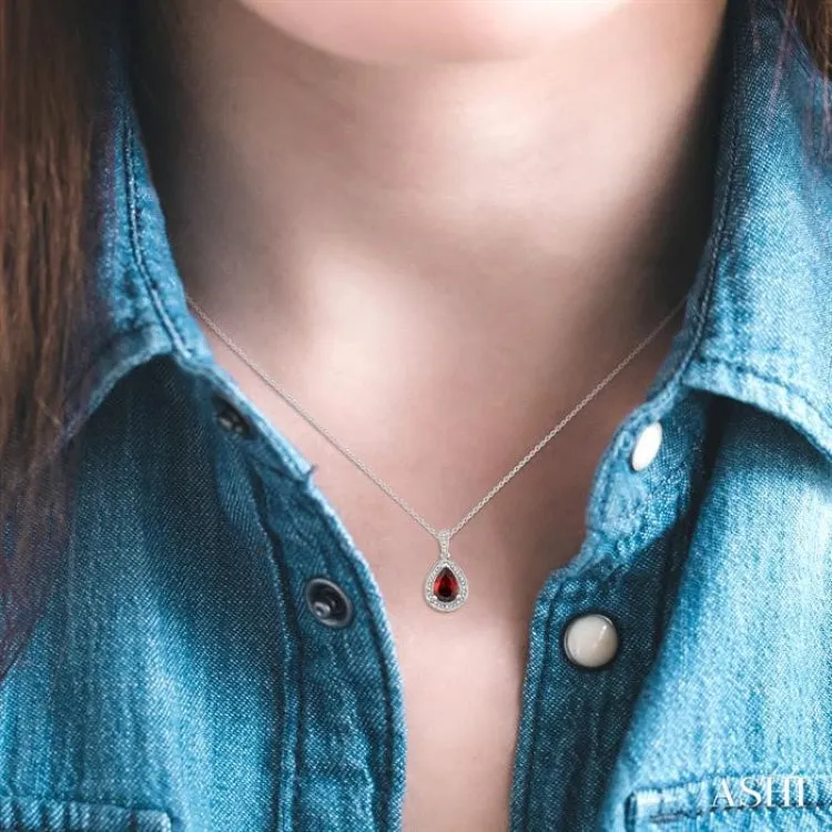 10x7 MM Pear Shape Garnet and 1/20 ctw Single Cut Diamond Pendant in Sterling Silver with chain