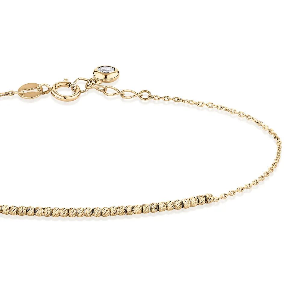 Bracelet with diamond simulant in 10 carat yellow gold