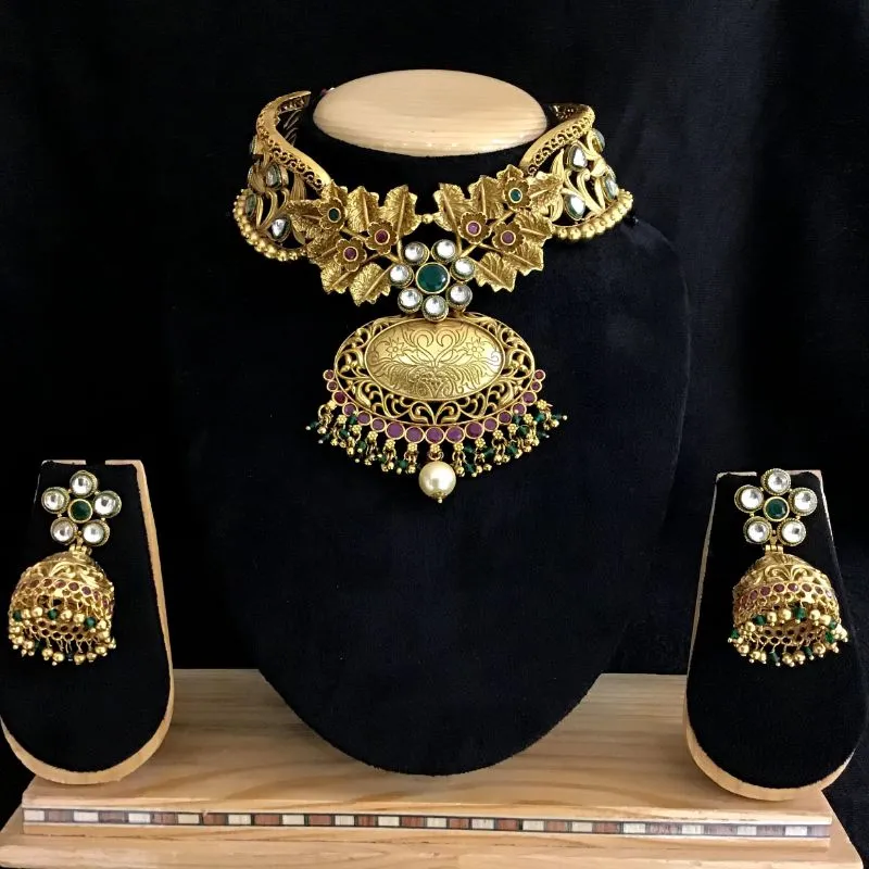 Designer Gold Look Choker Set With Ruby-Green Stones And A Pearl Latkan - Matching Jhumki
