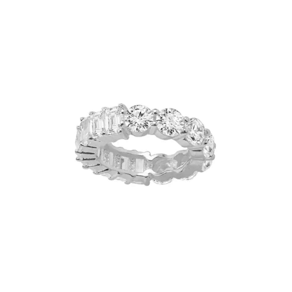 THE EMERALD CUT ROUND STONE ETERNITY BAND
